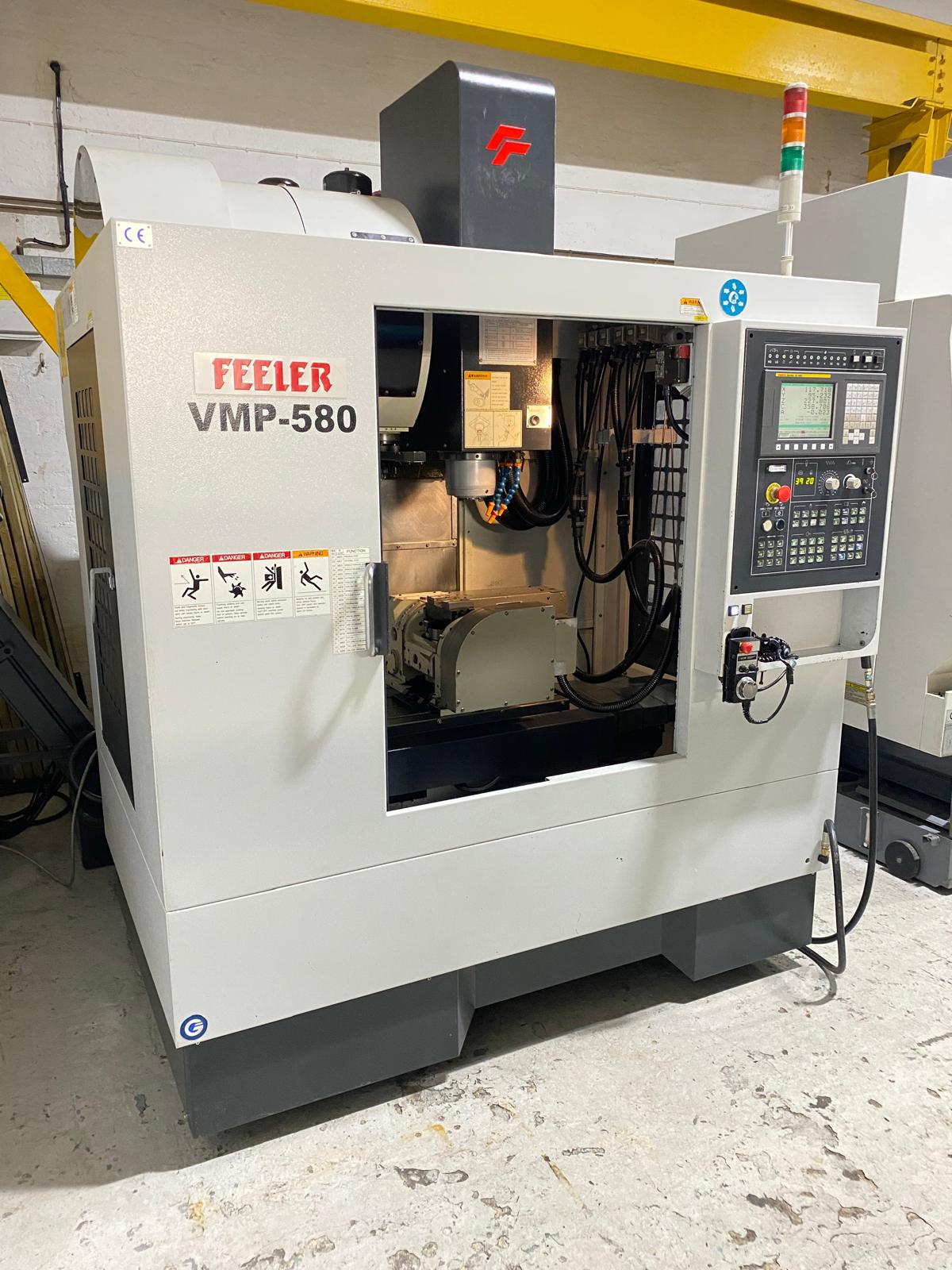 
                  
                    Feeler QMP-23A 5 Axis Machining Centre (2011)
                  
                